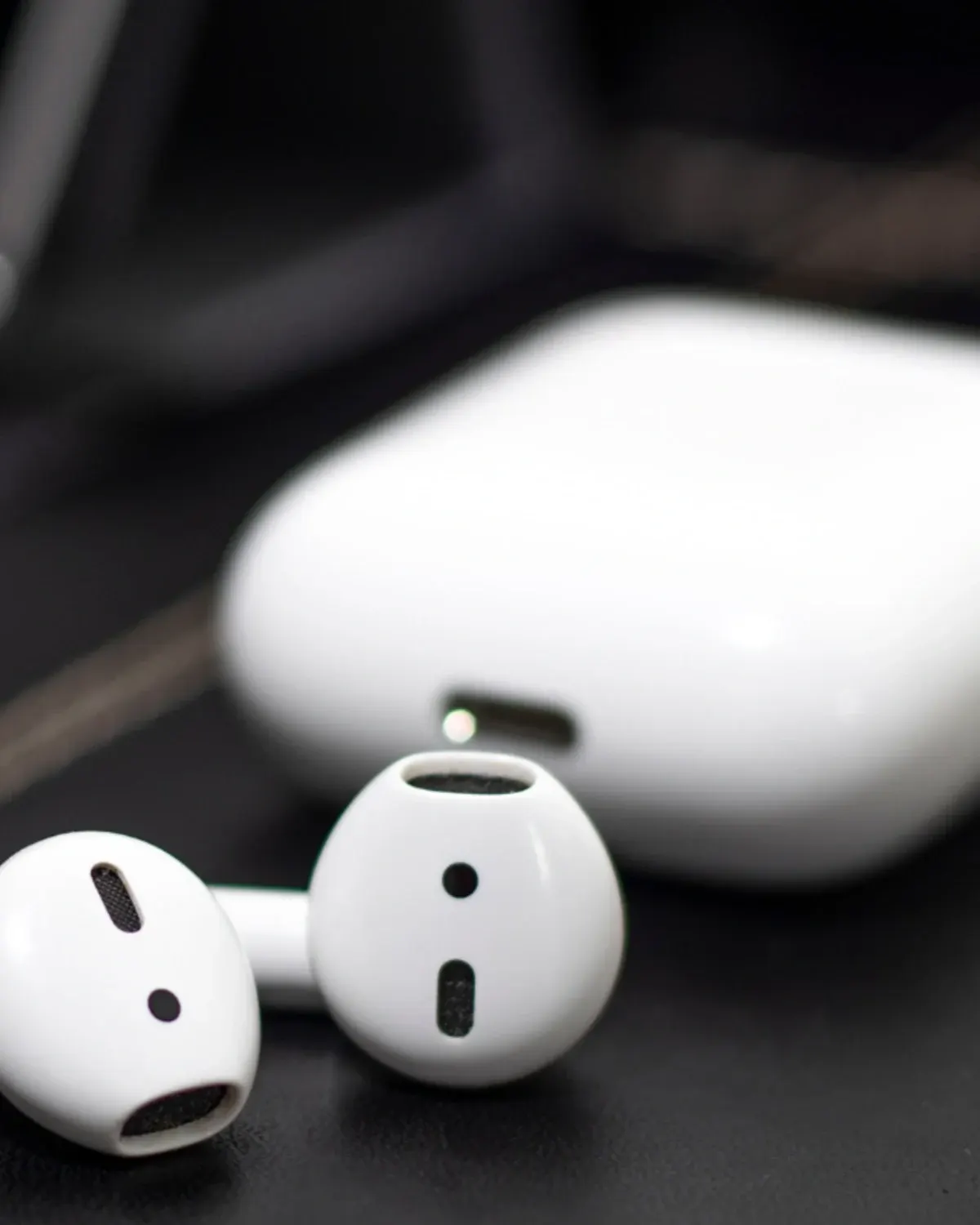 Auriculares blancos en fotografía de producto
